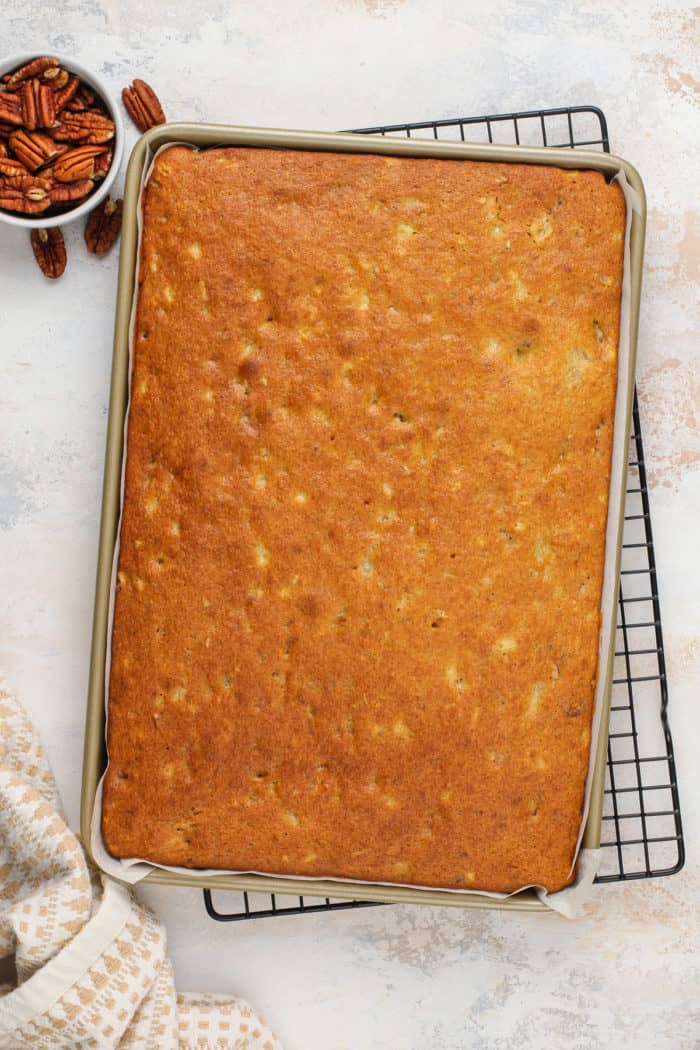 Pan of banana bars cooling on a wire rack.