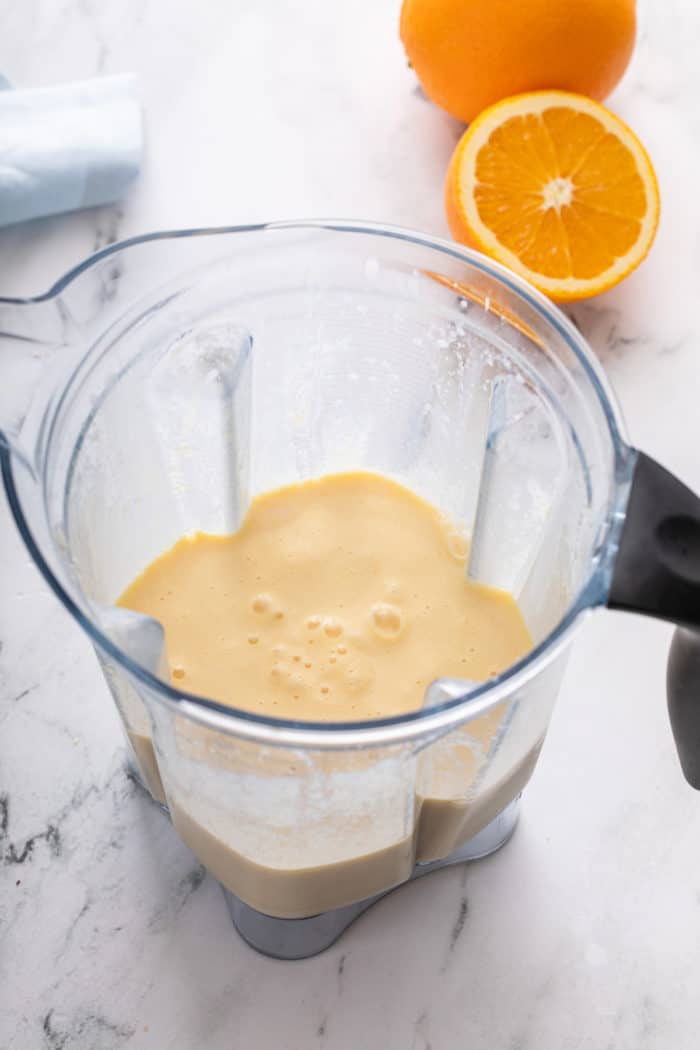 Blended orange julius in a blender.