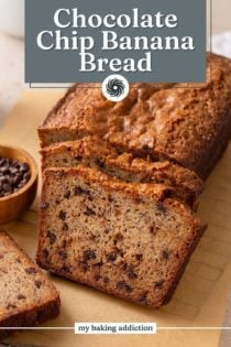 sliced loaf of chocolate chip banana bread on a piece of parchment paper. Text overlay includes recipe name.