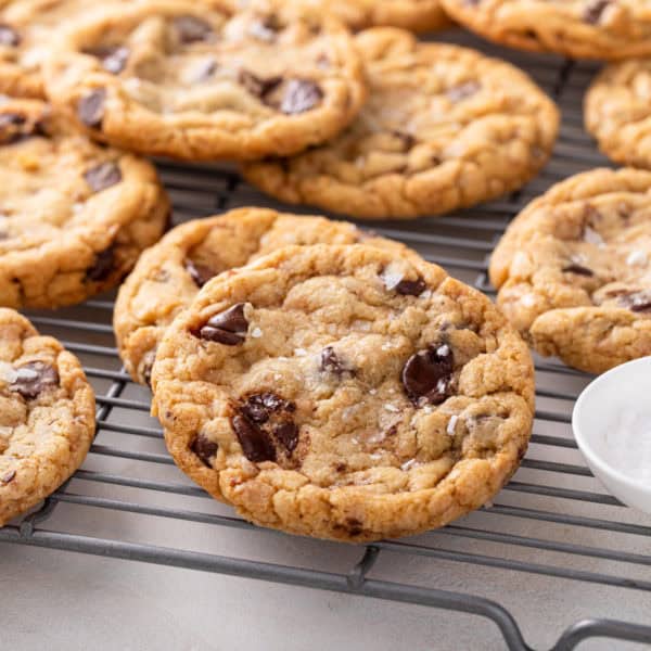 Heath bar cookies on a wire cooling rack.