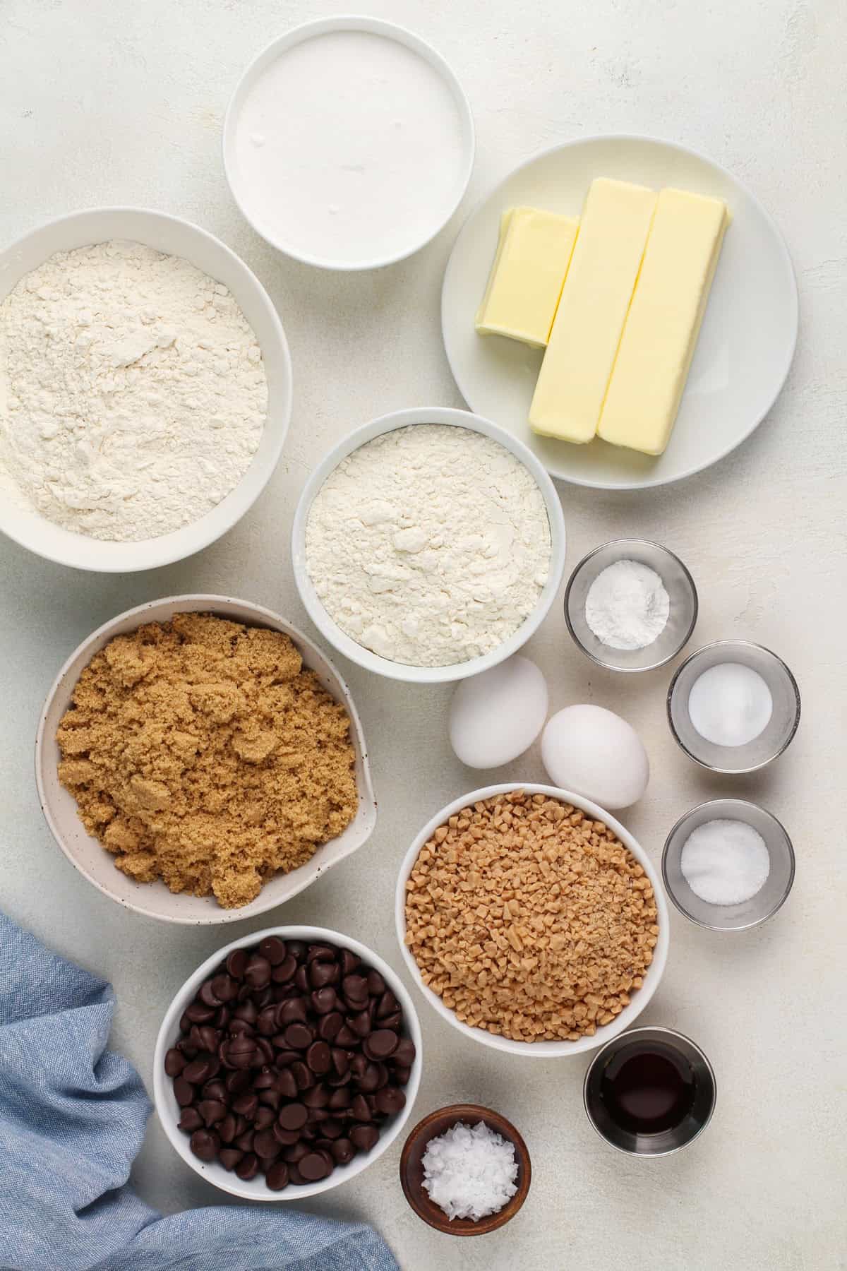 Ingredients for heath bar cookies arranged on a countertop.