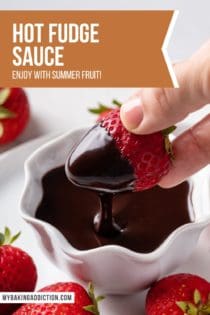 Strawberry being dipped into a white bowl of hot fudge sauce. Text overlay includes recipe name.