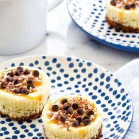 Turtle Cheesecake Cookie Cups are bite sized indulgences. You won't be able to stop at one!